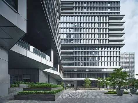Sleek modern building complex, symbolizing advanced electronics manufacturing and PCB design innovation. High-tech infrastructure supporting smart systems.
