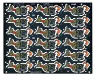 Panelized irregular custom shape PCBs in a manufacturing array, optimized for high-volume production. Dark PCBs with visible traces and components.